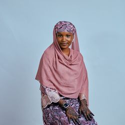 Portrait of Olga Zarichna, a smiling woman with a calm expression.